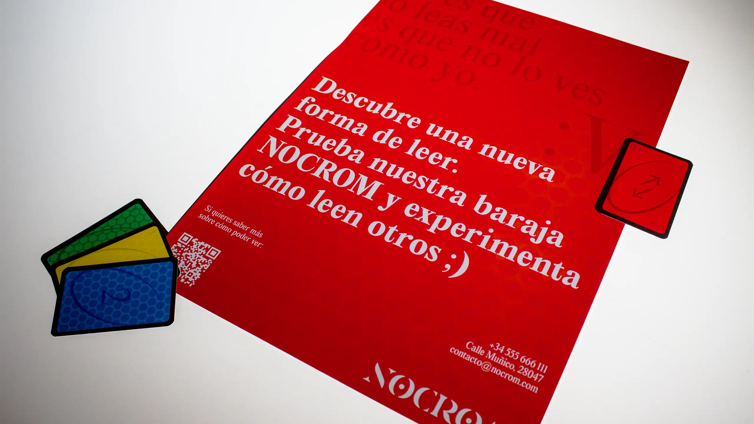 Pieza gráfica de cartelería roja de la campaña de NOCROM